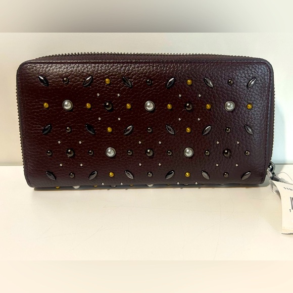 Coach Handbags - NWT COACH PRAIRIE RIVETS ZIP WALLET OXBLOOD/RED